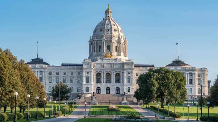 1321011782 featured image White domed building with green lawns and pathways.