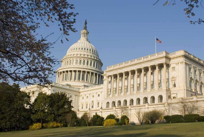 3033405 featured image United States Capitol building with surrounding trees.