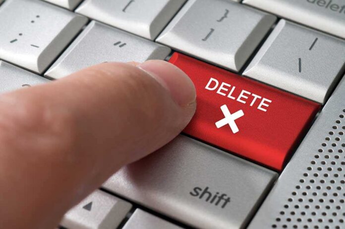 145675640 featured image Finger pressing red delete key on keyboard