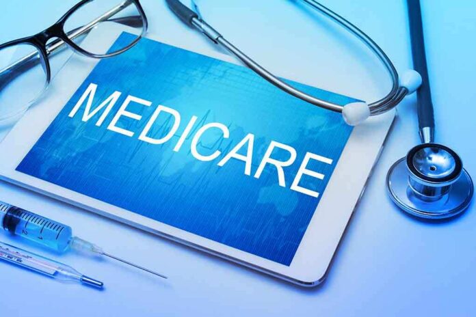 389134900 featured image Tablet displaying Medicare next to medical equipment