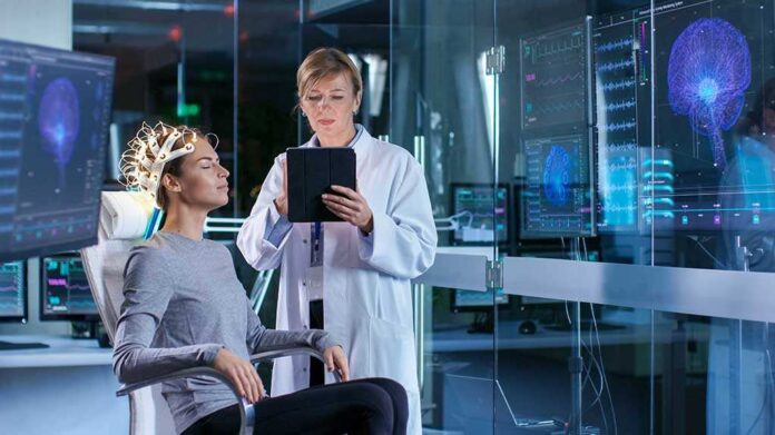 1036798276 featured image Woman undergoing brain scan with doctor monitoring results