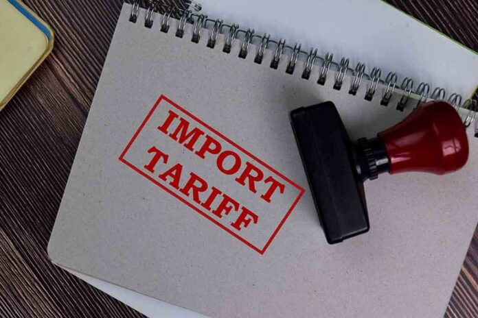 1773748721 featured image Notebook with import Tariff stamp and rubber stamper.