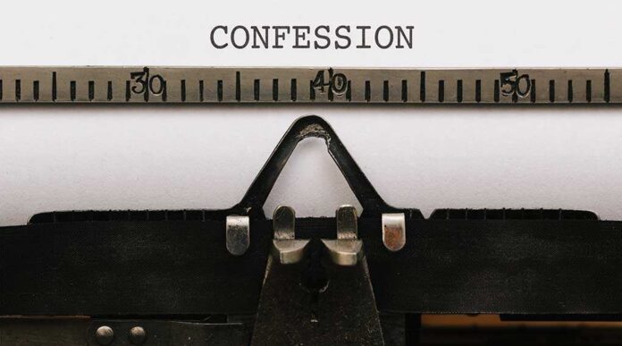 579321010 featured image Typewriter typing the word confession on paper