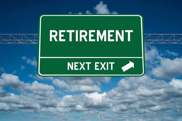 583127620 featured image Green road sign reading retirement next exit sky background