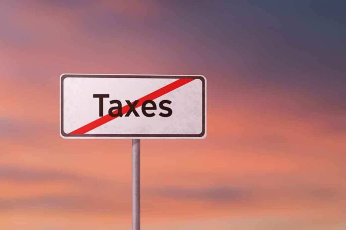 1135828310 featured image Sign with the word Taxes crossed out