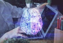 Futuristic AI brain hologram above a laptop computer