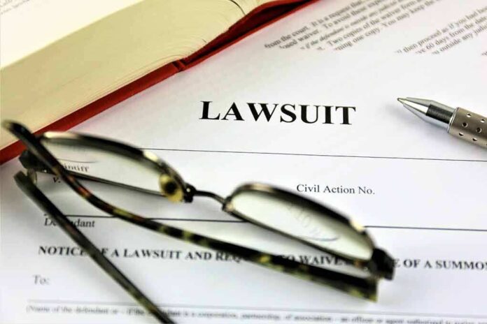 775833220 featured image Lawsuit paperwork with glassespenand an open book