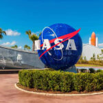 NASA logo sculpture with spaceship and palm trees