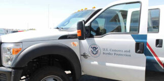 US Customs and Border Protection truck with open door