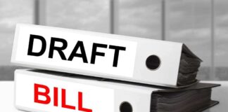 Two binders labeled Draft and Bill