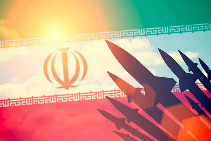 Silhouettes of missiles over Iran's flag graphic