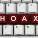 Howard Stern Hoax HUMILIATES Major Newsrooms Close-up of a computer keyboard with the word HOAX spelled out in red keys