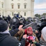 A tense standoff between protesters and police at a demonstration