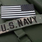 U.S. Navy patch with black-and-white American flag.