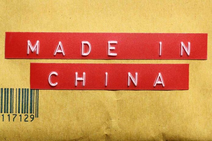 Red label reading MADE IN CHINA on brown packaging