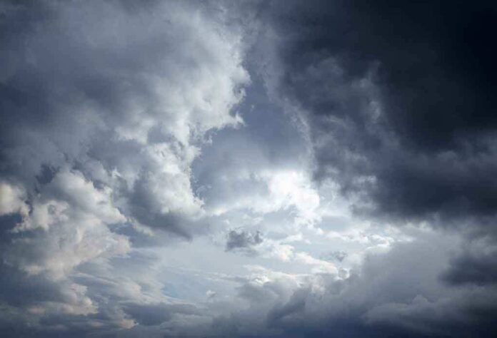 Dramatic clouds in a stormy sky with varying shades of gray