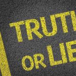 Yellow text on a black surface asking Truth or Lie?