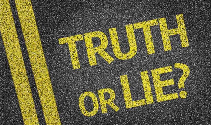 Yellow text on a black surface asking Truth or Lie?