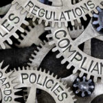 Gears labeled: rules, regulations, compliance, standards, policies.