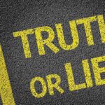 Yellow text on a black surface asking Truth or Lie