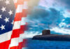 Navy Sub CRUSHED Records—Then Revealed Terrifying Truth American flag and submarine at sea under a cloudy sky.