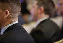 Jill Biden’s GUARD Shoots Himself — WHY? Security personnel with earpiece in a suit.