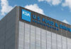 FDA Vaccine Chief OUSTED After Weeks FDA building with blue logo and sky background.