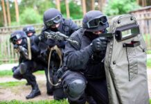 Loud Music Call Turns DEADLY A tactical team in black gear preparing for an operation