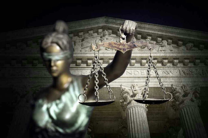 Blindfolded Lady Justice with scales, Supreme Court background.