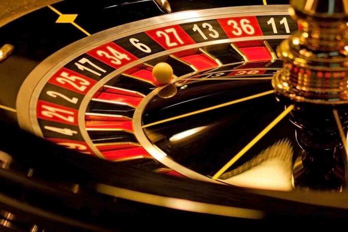 shutterstock_126023555.jpg Close-up of a roulette wheel with a spinning ball