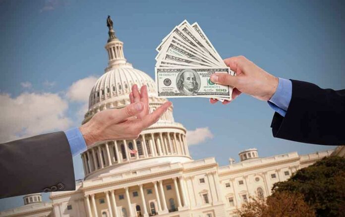 Hands exchanging cash in front of the Capitol building