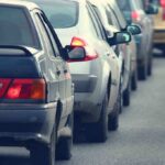 Trump KILLS Hated Car Feature—Obama Rule GONE A line of cars stuck in traffic on a roadway