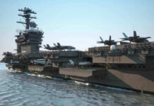 Aircraft carrier deck with jet planes.