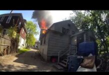 BODY CAM VIDEO: Officer catches baby dropped from window of burning home in Kalamazoo