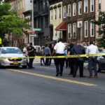 The 22-Year-Old Who Chased Thieves — And Paid With His Life Police gathered at an urban crime scene.