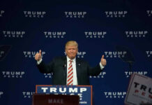 “It’s Raining Jobs” — While Markets Were Bleeding Red Man giving thumbs up at Trump Pence rally.