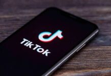 smartphone displaying the TikTok app logo on screen