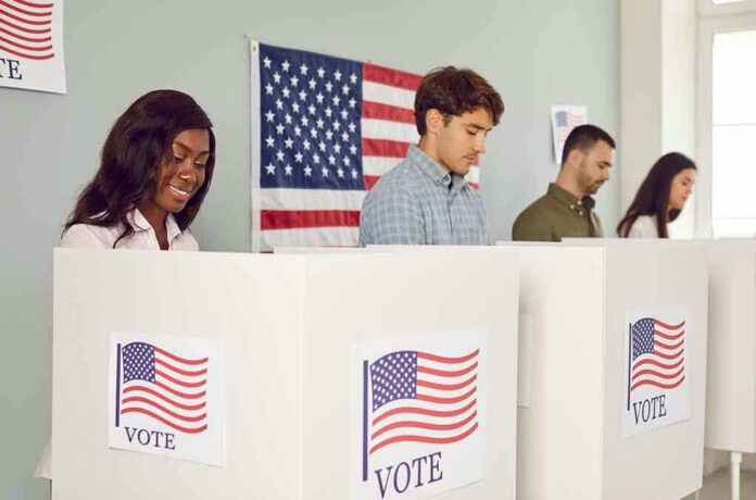 Voters casting ballots at polling booths