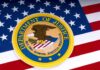 Department of Justice seal on American flag background