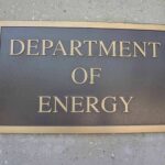 Department of Energy sign on building wall