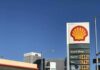 Shell gas station with price sign on a sunny day