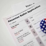 Absentee ballot application with patriotic button