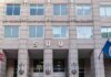 US government building facade with flags and number 500