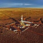 Oil drilling rig at remote desert site