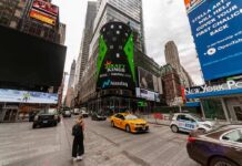 Times Square street with taxis, billboards, and skyscrapers
