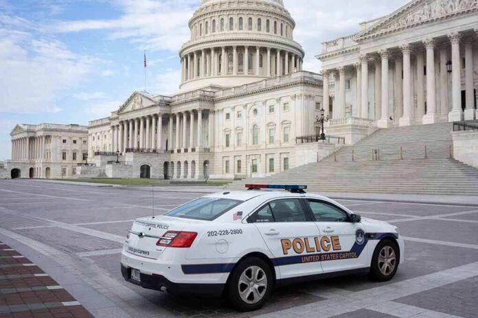 shutterstock_2180189067 Police car parked outside the United States Capitol building