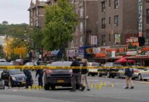 Rabbi Beaten Minutes After Another Man Attacked Police investigate a taped-off urban street crime scene