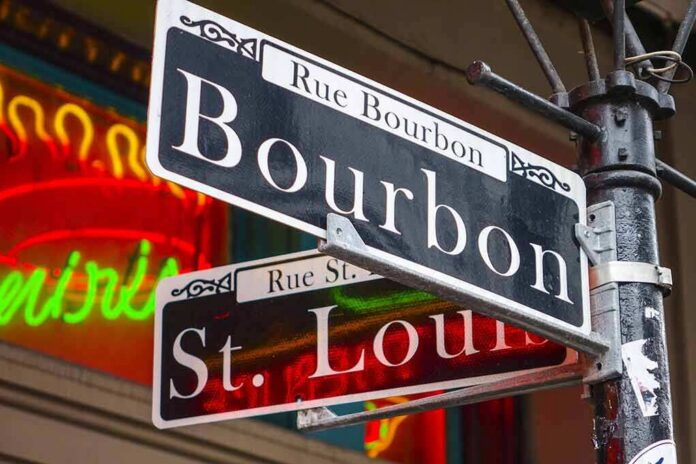 Street signs for Bourbon and St. Louis on a pole