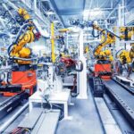 General Dynamics’ Costly Reboot Raises Eyebrows Industrial robots assembling parts on an automated factory line