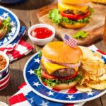 Cheeseburger with chips on a star-patterned plate